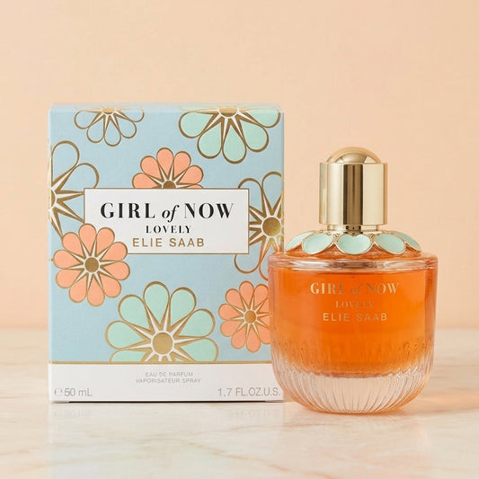 Elie Saab Girl of Now Lovely junto a su caja azul de flores