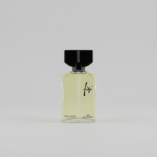 Guy Laroche Fidji eau de toilette 100 ml sobre fondo gris