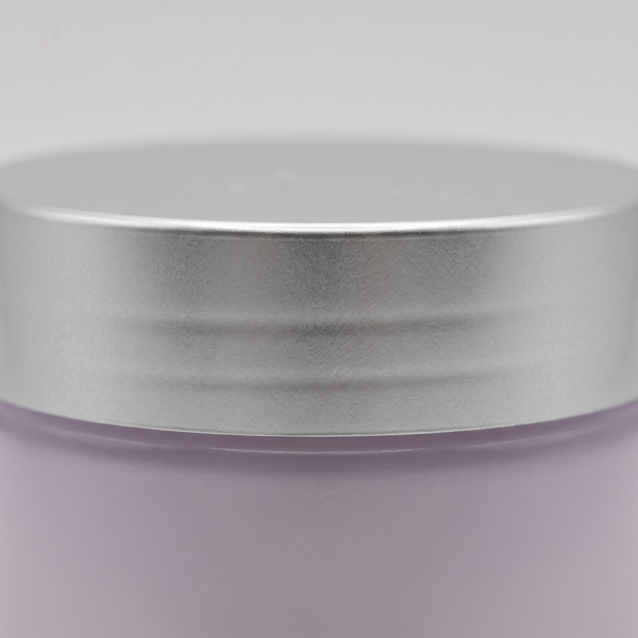 Tarro de la crema de cuello OUHOE de cerca