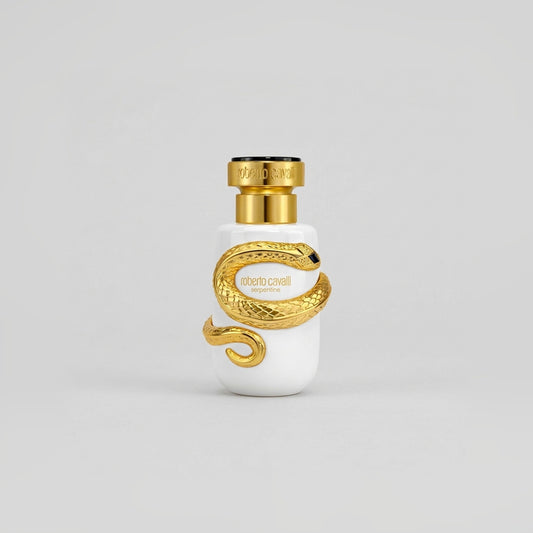Roberto Cavalli Serpentine eau de parfum 100 ml, frasco blanco con serpiente dorada, sobre fondo gris